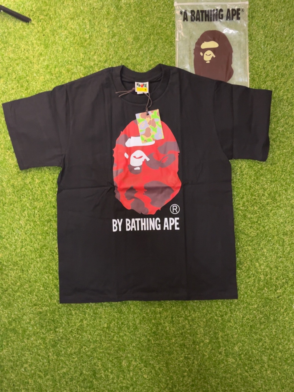 A Bathing Ape Black Short Sleeve Tee with Red Camo Ape Logo